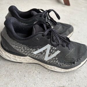 Woman’s running shoes (worn)